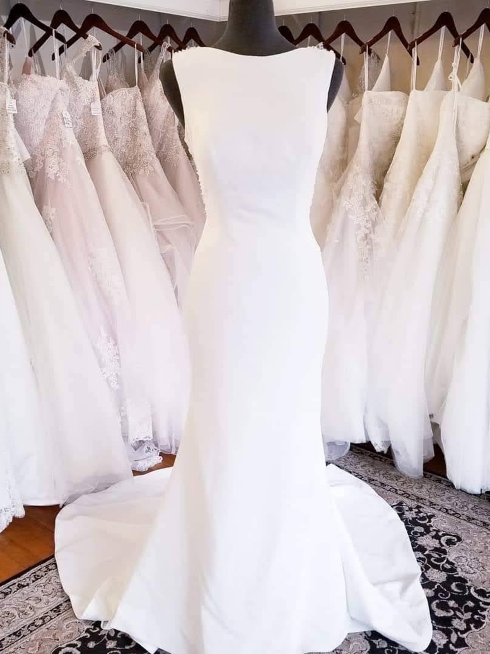 Elegant Ivory Bridal Gown With Dramatic Back
